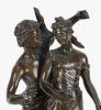 Según modelo de EMILE BRUCHON (1806 - 1895). Bronces.