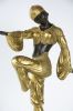 Siguiendo modelos de DIMITRI CHIPARUS (Dorohoi, Rumanía, 1886- París, 1947).. Bronces.