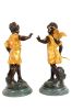 Pareja de figuras de bronce, S. XX.. Bronces.