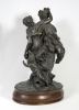 Según modelo de CLAUDE MICHEL CLODION (1738-1814).. Bronces.