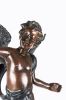 Pareja de figuras de cupido, ppios. S. XX. Bronces.